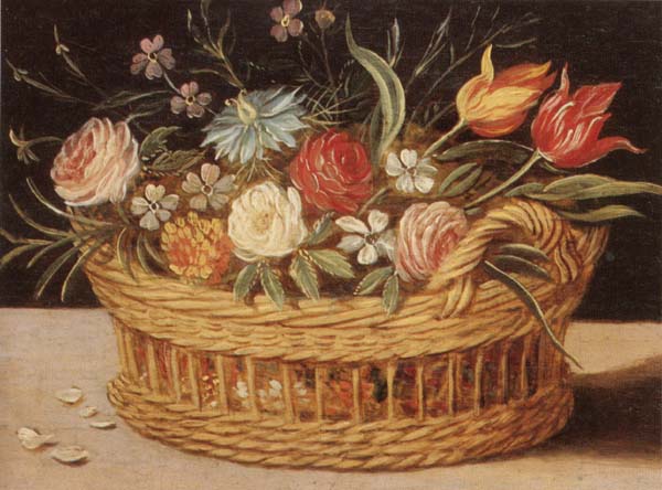 Still life of roses,tulips,chyrsanthemums and cornflowers,in a wicker basket,upon a ledge